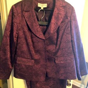 Matching pair, three button jacket and matching pencil skirt.